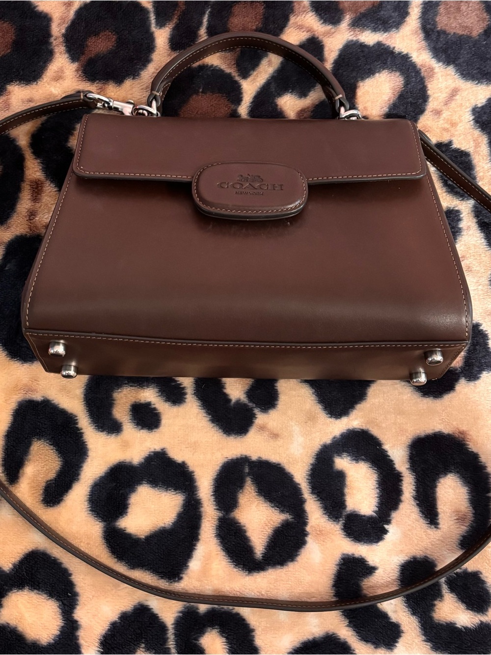 Brown leather Coach | trapezoidal bag